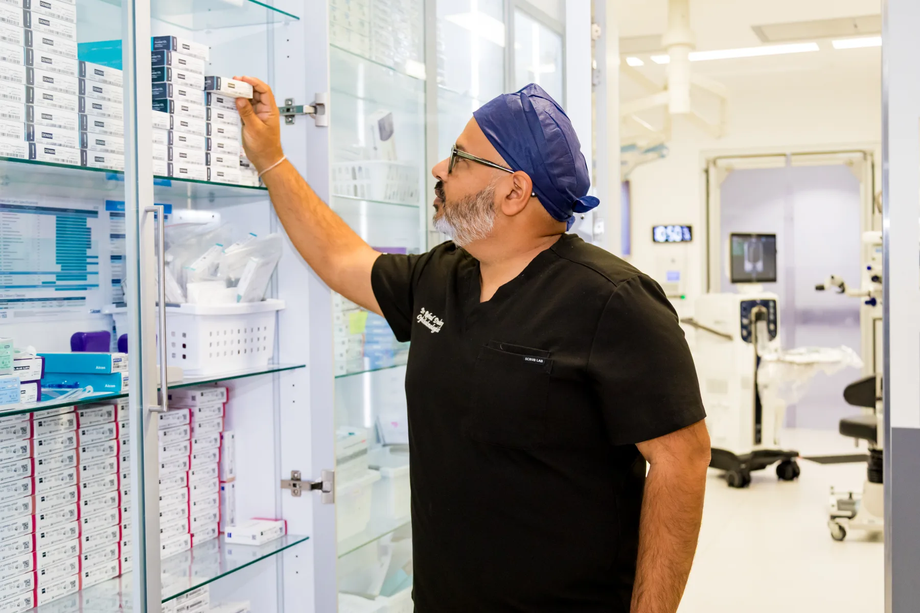 Dr Rahul Dubey preparing advanced ophthalmic equipment