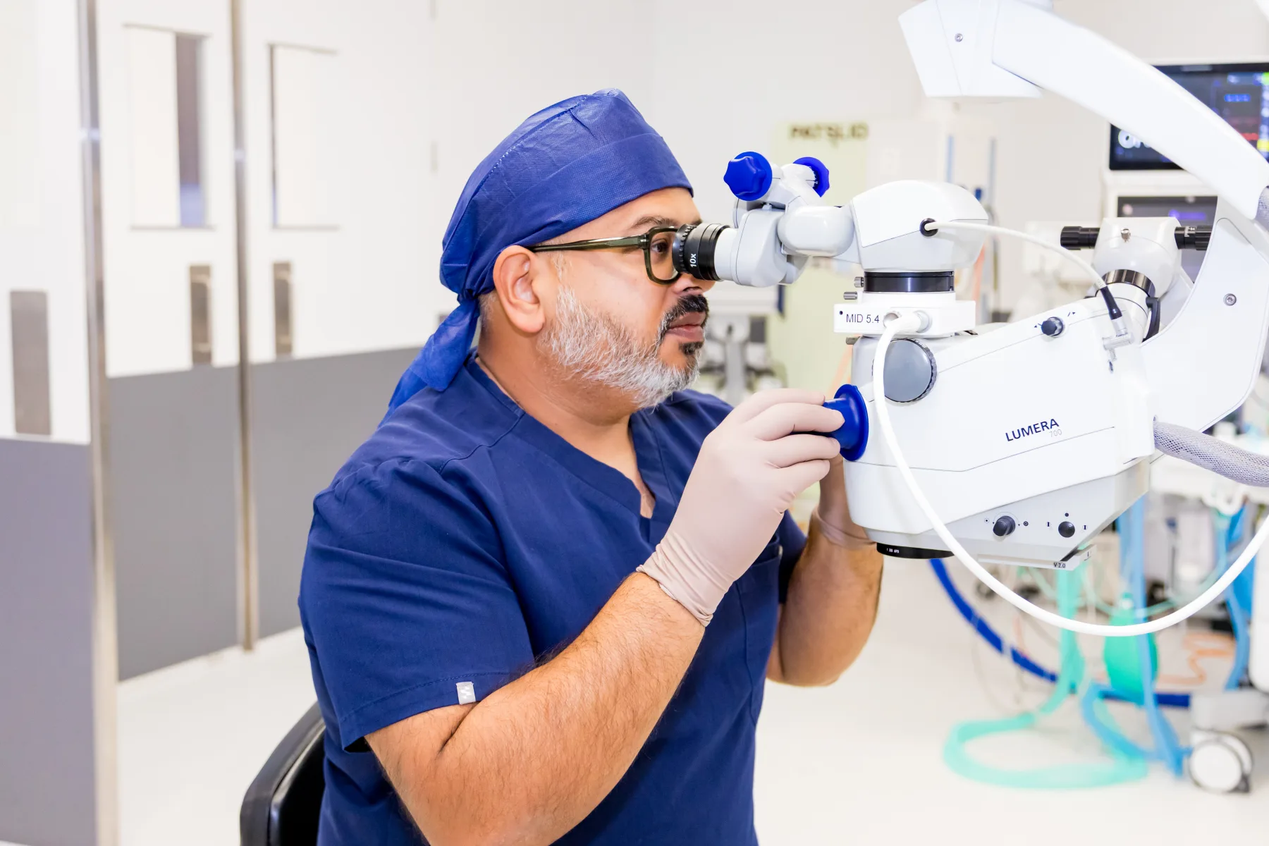 Dr Rahul Dubey using an ophthalmic microscope